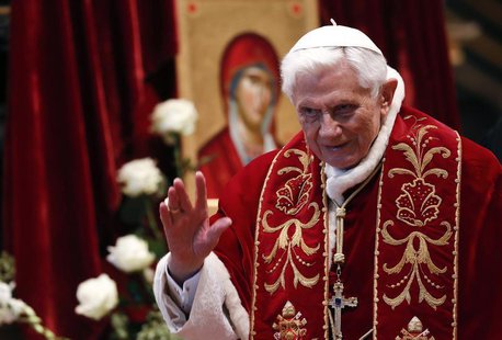 Pope Benedict XVI waves during a mass conducted by Cardinal Tarcisio Bertone, for the 900th anniversary of the Order of the Knights of Malta Pope Benedict XVI waves during a mass conducted by Cardinal Tarcisio Bertone, for the 900th anniversary of the Order of the Knights of Malta