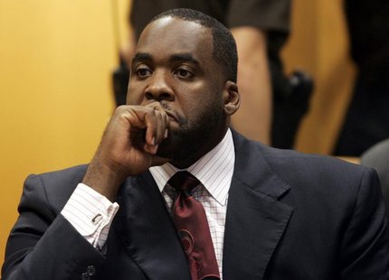 Former Detroit Mayor Kwame Kilpatrick sits in a Wayne County Circuit Court room during a bond hearing to request removal of his court ordere Former Detroit Mayor Kwame Kilpatrick sits in a Wayne County Circuit Court room during a bond hearing to request removal of his court ordere