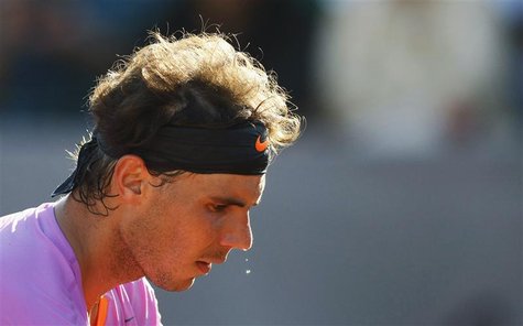 Spain's Rafael Nadal prepares to serve to Argentina's Horacio Zeballos during the men's singles final match at the Chilean Open tennis tourn Spain's Rafael Nadal prepares to serve to Argentina's Horacio Zeballos during the men's singles final match at the Chilean Open tennis tourn