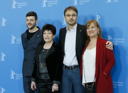 Actors Bogdan Dumitrache (L-R), Luminita Gheorghiu, director Calin Peter Netzer and producer Ada Solomon pose during a photocall to promote Actors Bogdan Dumitrache (L-R), Luminita Gheorghiu, director Calin Peter Netzer and producer Ada Solomon pose during a photocall to promote