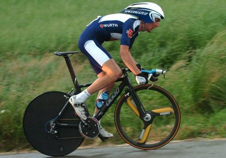Joerg Jaksche of Germany cycles in pouring rain during the individual time-trial stage of the Tour de Suisse cycling race from Kerzers to Be Joerg Jaksche of Germany cycles in pouring rain during the individual time-trial stage of the Tour de Suisse cycling race from Kerzers to Be