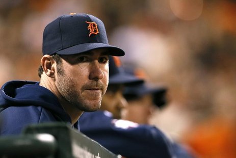Detroit Tigers starting pitcher Justin Verlander watches from the dugout in the seventh inning during Game 1 of the MLB World Series basebal Detroit Tigers starting pitcher Justin Verlander watches from the dugout in the seventh inning during Game 1 of the MLB World Series basebal