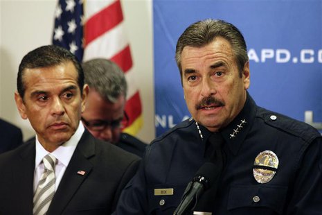 LAPD Police Chief Charlie Beck (R) speaks as Los Angeles Mayor Antonio Villaraigosa (L) looks on during a news conference at the LAPD Headqu LAPD Police Chief Charlie Beck (R) speaks as Los Angeles Mayor Antonio Villaraigosa (L) looks on during a news conference at the LAPD Headqu
