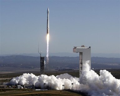The United Launch Alliance (ULA) Atlas-V rocket with the Landsat Data Continuity Mission (LDCM) spacecraft onboard is seen as it launches at The United Launch Alliance (ULA) Atlas-V rocket with the Landsat Data Continuity Mission (LDCM) spacecraft onboard is seen as it launches at
