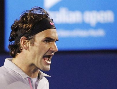 Roger Federer of Switzerland reacts during his men's singles semi-final match against Andy Murray of Britain at the Australian Open tennis t Roger Federer of Switzerland reacts during his men's singles semi-final match against Andy Murray of Britain at the Australian Open tennis t