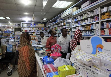 A customer buys medication at a pharmacy in Khartoum January 13, 2013. REUTERS/Mohamed Nureldin Abdallah A customer buys medication at a pharmacy in Khartoum January 13, 2013. REUTERS/Mohamed Nureldin Abdallah