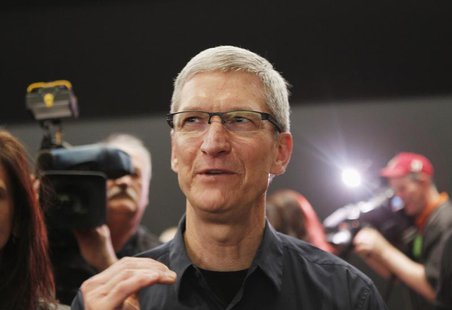 Apple CEO Tim Cook speaks in the demonstration room after the Apple event introducing the new iPad in San Francisco, California March 7, 201 Apple CEO Tim Cook speaks in the demonstration room after the Apple event introducing the new iPad in San Francisco, California March 7, 201