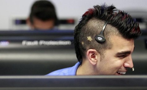 Activity lead Bobak Ferdowsi, who cuts his hair differently for each mission, works inside the Spaceflight Operations Facility for NASA's Ma Activity lead Bobak Ferdowsi, who cuts his hair differently for each mission, works inside the Spaceflight Operations Facility for NASA's Ma