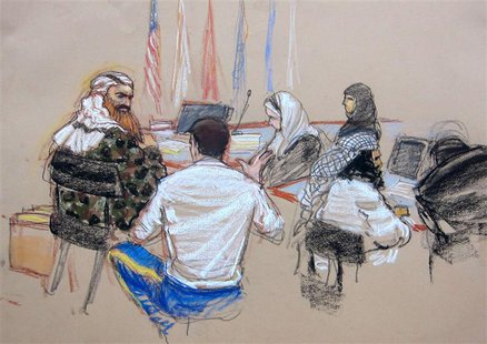 In this Pentagon-approved courtroom sketch, alleged 9/11 mastermind Khalid Sheikh Mohammad (L) confers with defense attorney Army Captain Ja In this Pentagon-approved courtroom sketch, alleged 9/11 mastermind Khalid Sheikh Mohammad (L) confers with defense attorney Army Captain Ja