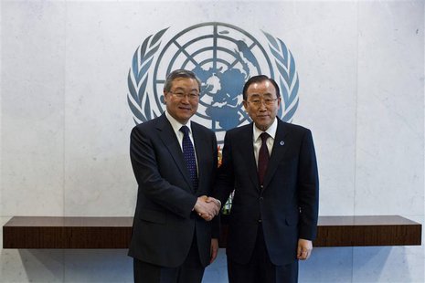 South Korea's Foreign Minister Kim Sung-Hwan (L) shakes hands with United Nations General Secretary Ban-Ki Moon at the U.N. headquarters in South Korea's Foreign Minister Kim Sung-Hwan (L) shakes hands with United Nations General Secretary Ban-Ki Moon at the U.N. headquarters in