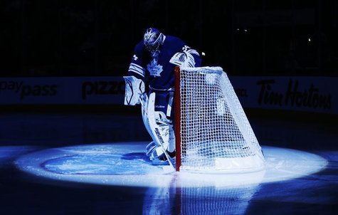Toronto Maple Leafs goalie James Reimer is seen in the pre-game spotlight before they play the Philadelphia Flyers in their NHL hockey game Toronto Maple Leafs goalie James Reimer is seen in the pre-game spotlight before they play the Philadelphia Flyers in their NHL hockey game