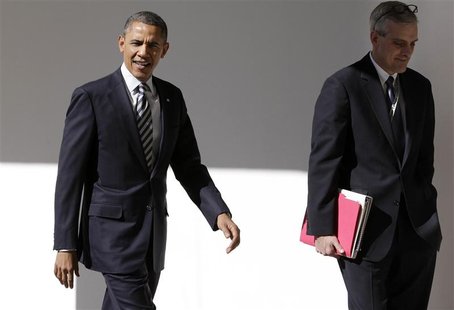 U.S. President Barack Obama (L) walks with Denis McDonough, the White House Chief of Staff, through the colonnade of the White House in Wash U.S. President Barack Obama (L) walks with Denis McDonough, the White House Chief of Staff, through the colonnade of the White House in Wash