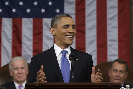 U.S. President Barack Obama (C), flanked by Vice President Joe Biden (L) and House Speaker John Boehner (D-OH), delivers his State of the Un U.S. President Barack Obama (C), flanked by Vice President Joe Biden (L) and House Speaker John Boehner (D-OH), delivers his State of the Un
