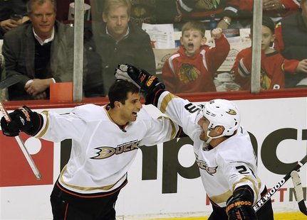 Anaheim Ducks' Andrew Cogliano (L) celebrates his goal with teammate Francois Beauchemin during the third period of their NHL hockey game ag Anaheim Ducks' Andrew Cogliano (L) celebrates his goal with teammate Francois Beauchemin during the third period of their NHL hockey game ag