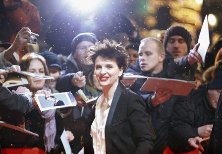 Fans react as actress Juliette Binoche arrives at the red carpet for the screening of the movie "Camille Claudel 1915" at the 63rd Berlinale Fans react as actress Juliette Binoche arrives at the red carpet for the screening of the movie "Camille Claudel 1915" at the 63rd Berlinale