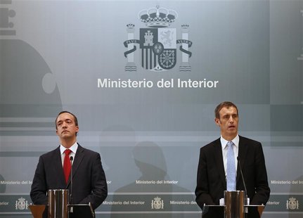 Director of Europol Rob Wainwright (R) speaks next to Spain's Security State Secretary Francisco Martinez during a news conference at the In Director of Europol Rob Wainwright (R) speaks next to Spain's Security State Secretary Francisco Martinez during a news conference at the In