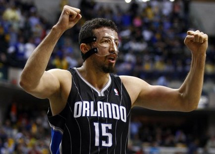 Orlando Magic forward Hedo Turkoglu of Turkey celebrates near the end of Game 1 of their first round NBA Eastern Conference basketball playo Orlando Magic forward Hedo Turkoglu of Turkey celebrates near the end of Game 1 of their first round NBA Eastern Conference basketball playo