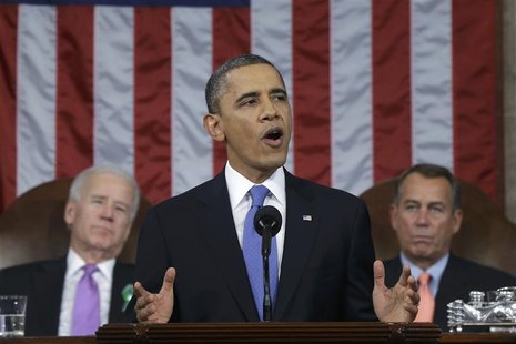 U.S. President Barack Obama (C), flanked by Vice President Joe Biden (L) and House Speaker John Boehner (D-OH), delivers his State of the Un U.S. President Barack Obama (C), flanked by Vice President Joe Biden (L) and House Speaker John Boehner (D-OH), delivers his State of the Un
