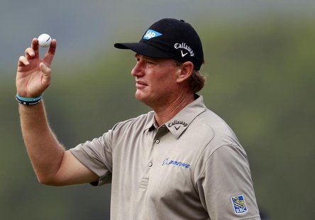 Ernie Els of South Africa acknowledges spectators on the 18th green during the third day of the WGC-HSBC Champions Tournament at Mission Hil Ernie Els of South Africa acknowledges spectators on the 18th green during the third day of the WGC-HSBC Champions Tournament at Mission Hil