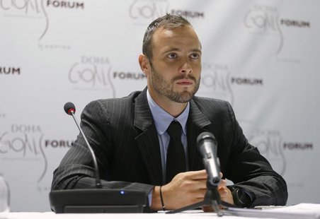 Paralympic and Olympic runner Oscar Pistorius of South Africa speaks during a news conference after the official opening ceremony of the Doh Paralympic and Olympic runner Oscar Pistorius of South Africa speaks during a news conference after the official opening ceremony of the Doh