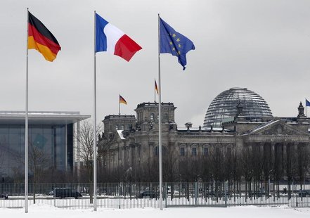 A German, French and an EU flag flutter over the German lower house of parliament in Berlin January 22, 2013. REUTERS/Fabrizio Bensch A German, French and an EU flag flutter over the German lower house of parliament in Berlin January 22, 2013. REUTERS/Fabrizio Bensch