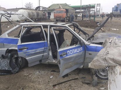 A police car is seen damaged by an explosion near a security checkpoint in the city of Khasavyurt, in the province of Dagestan, February 14, A police car is seen damaged by an explosion near a security checkpoint in the city of Khasavyurt, in the province of Dagestan, February 14,