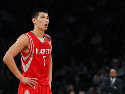 Houston Rockets point guard Jeremy Lin looks on against the New York Knicks in the second quarter of their NBA basketball game at Madison Sq Houston Rockets point guard Jeremy Lin looks on against the New York Knicks in the second quarter of their NBA basketball game at Madison Sq