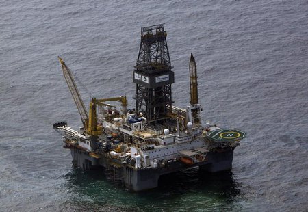 The Transocean Development Driller III, which is drilling the relief well, is seen surrounded by part of the oil slick covering the site of The Transocean Development Driller III, which is drilling the relief well, is seen surrounded by part of the oil slick covering the site of