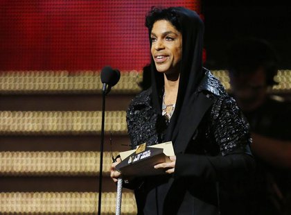 Singer Prince speaks on stage at the 55th annual Grammy Awards in Los Angeles, California, February 10, 2013. REUTERS/Mike Blake Singer Prince speaks on stage at the 55th annual Grammy Awards in Los Angeles, California, February 10, 2013. REUTERS/Mike Blake