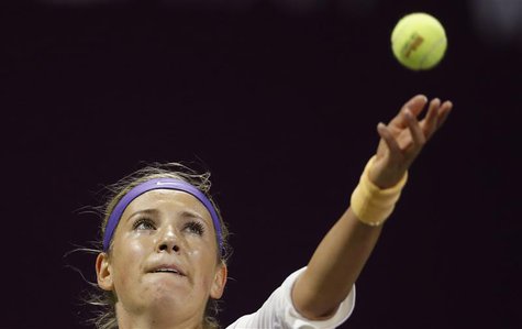 Victoria Azarenka of Belarus serves the ball to Christina Mchale of U.S during their women's match at the Qatar Open tennis tournament in Do Victoria Azarenka of Belarus serves the ball to Christina Mchale of U.S during their women's match at the Qatar Open tennis tournament in Do