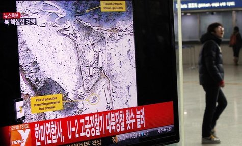 A passenger walks past a television report on North Korea's nuclear test at a railway station in Seoul February 12, 2013. REUTERS/Kim Hong-J A passenger walks past a television report on North Korea's nuclear test at a railway station in Seoul February 12, 2013. REUTERS/Kim Hong-J