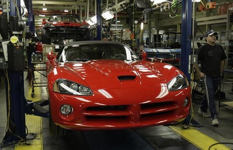 A Chrysler auto assembly worker walks past a 2008 Dodge Viper on the assembly line of the Chrysler Conner Avenue Assembly plant Detroit, Mic A Chrysler auto assembly worker walks past a 2008 Dodge Viper on the assembly line of the Chrysler Conner Avenue Assembly plant Detroit, Mic