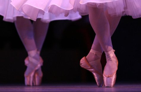 Ballerinas perform during a dress rehearsal for the ballet "Coppelia" at the Royal Opera House in Covent Garden in central London in this fi Ballerinas perform during a dress rehearsal for the ballet "Coppelia" at the Royal Opera House in Covent Garden in central London in this fi