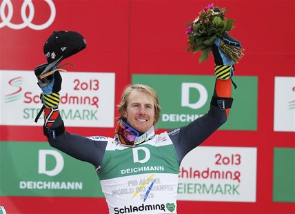 First placed Ted Ligety of the U.S. celebrates on the podium during the flower ceremony after the men's Giant Slalom race at the World Alpin First placed Ted Ligety of the U.S. celebrates on the podium during the flower ceremony after the men's Giant Slalom race at the World Alpin
