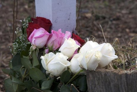 Roses are seen at the entrance to Sandy Hook Elementary School in Newtown, Connecticut January 14, 2013, on the one-month anniversary of the Roses are seen at the entrance to Sandy Hook Elementary School in Newtown, Connecticut January 14, 2013, on the one-month anniversary of the