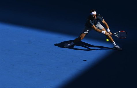 Juan Martin del Potro of Argentina hits a return to Jeremy Chardy of France during their men's singles match at the Australian Open tennis t Juan Martin del Potro of Argentina hits a return to Jeremy Chardy of France during their men's singles match at the Australian Open tennis t