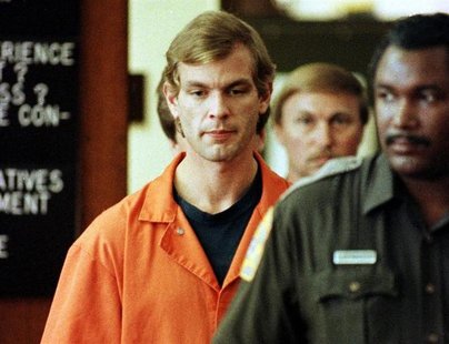 Serial killer Jeffrey Dahmer is escorted into a Milwaukee County Circuit Court by a Milwaukee County Sheriffs Deputy for his second appearan Serial killer Jeffrey Dahmer is escorted into a Milwaukee County Circuit Court by a Milwaukee County Sheriffs Deputy for his second appearan