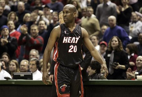 Miami Heat guard Gary Payton looks back at officials after he was charged with two technical fouls and ejected from the game in the first ha Miami Heat guard Gary Payton looks back at officials after he was charged with two technical fouls and ejected from the game in the first ha