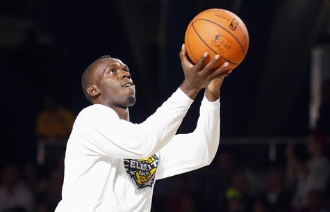 Jamaican sprinter Usain Bolt warms up before the start of the NBA All-Star celebrity basketball game in Houston, Texas, February 15, 2013. T Jamaican sprinter Usain Bolt warms up before the start of the NBA All-Star celebrity basketball game in Houston, Texas, February 15, 2013. T