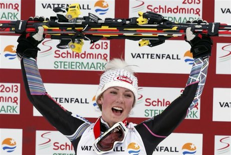 First placed Mikaela Shiffrin of the U.S. reacts on the podium during the flower ceremony after the women's Slalom race at the World Alpine First placed Mikaela Shiffrin of the U.S. reacts on the podium during the flower ceremony after the women's Slalom race at the World Alpine