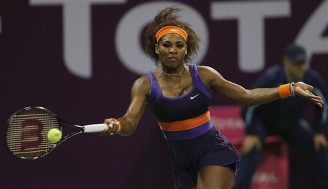 Serena Williams of the U.S. returns the ball to Maria Sharapova of Russia during their women's semi-final match at the Qatar Open tennis tou Serena Williams of the U.S. returns the ball to Maria Sharapova of Russia during their women's semi-final match at the Qatar Open tennis tou