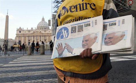 A newspaper seller shows newspapers with photographs of Pope Benedict XVI outside the Vatican February 17, 2013. Thousands of people are exp A newspaper seller shows newspapers with photographs of Pope Benedict XVI outside the Vatican February 17, 2013. Thousands of people are exp