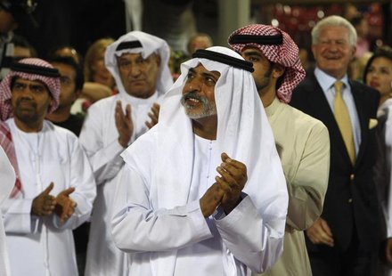 Sheikh Nahayan bin Mubarak al-Nahayan applauds the top three riders during the prize-giving ceremony of the Global Champions Tour 2011 at th Sheikh Nahayan bin Mubarak al-Nahayan applauds the top three riders during the prize-giving ceremony of the Global Champions Tour 2011 at th