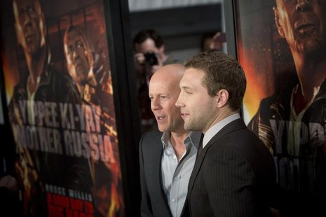 Cast members Jai Courtney (R) and Bruce Willis meet with fans to celebrate the opening of their new film "A Good Day To Die Hard" in New Yor Cast members Jai Courtney (R) and Bruce Willis meet with fans to celebrate the opening of their new film "A Good Day To Die Hard" in New Yor