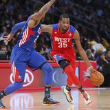 NBA All-Star Kevin Durant of the Oklahoma Thunder (35) drives the ball past All-Star Paul George of the Indianapolis Pacers during the NBA A NBA All-Star Kevin Durant of the Oklahoma Thunder (35) drives the ball past All-Star Paul George of the Indianapolis Pacers during the NBA A