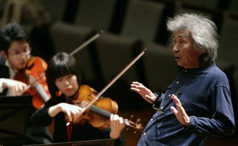 Maestro Seiji Ozawa conducts the Seiji Ozawa Ongaku-juku orchestra during a rehearsal at the National Theatre in Beijing April 15, 2009. REU Maestro Seiji Ozawa conducts the Seiji Ozawa Ongaku-juku orchestra during a rehearsal at the National Theatre in Beijing April 15, 2009. REU