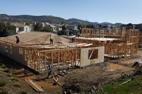 Construction workers build new homes at a development area in San Marcos, California March 20, 2012. REUTERS/Mike Blake Construction workers build new homes at a development area in San Marcos, California March 20, 2012. REUTERS/Mike Blake