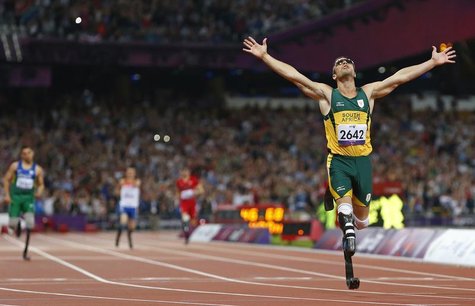 Oscar Pistorius of South Africa celebrates winning the Men's 400m T44 Final during the London 2012 Paralympic Games at the Olympic Stadium i Oscar Pistorius of South Africa celebrates winning the Men's 400m T44 Final during the London 2012 Paralympic Games at the Olympic Stadium i