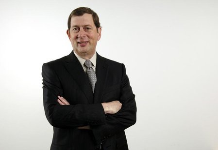 John Martin, CEO of Gilead, poses before speaking to reporters during the Reuters 2006 Biotechnology Summit in Los Angeles February 23, 2006 John Martin, CEO of Gilead, poses before speaking to reporters during the Reuters 2006 Biotechnology Summit in Los Angeles February 23, 2006