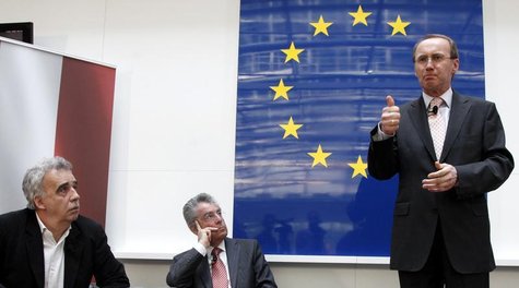 Othmar Karas, delegate of the European Parliament and member of Austria's Peoples Party (OeVP) (R) delivers a speech as Austrian President H Othmar Karas, delegate of the European Parliament and member of Austria's Peoples Party (OeVP) (R) delivers a speech as Austrian President H